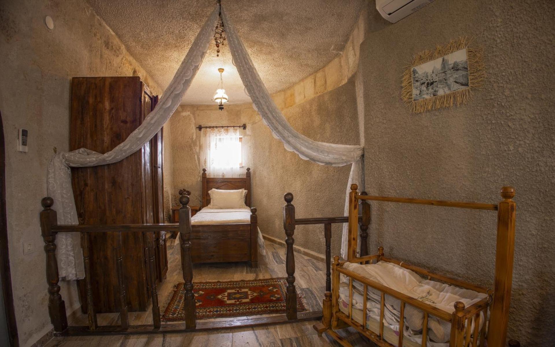Maccan Cave Hotel Гьореме Номер фото