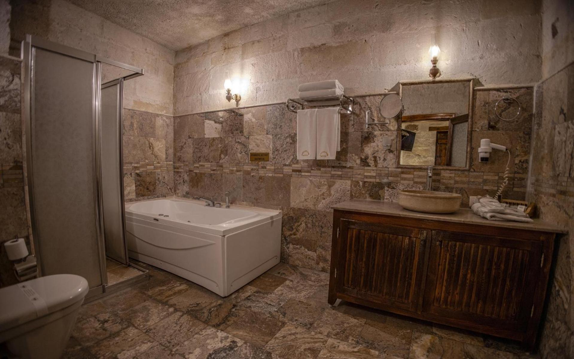 Maccan Cave Hotel Гьореме Номер фото