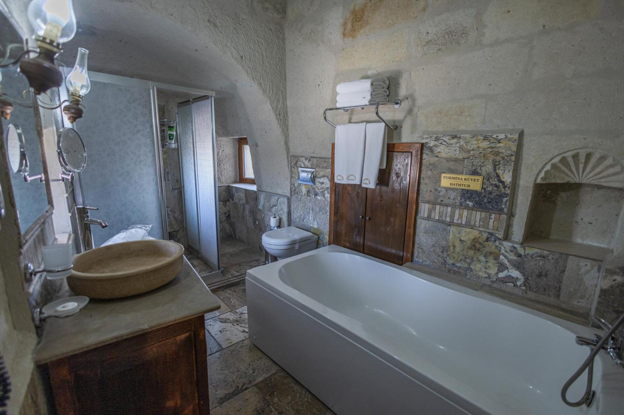 Maccan Cave Hotel Гьореме Номер фото